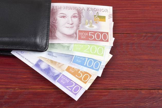 Geld aus Schweden in der schwarzen Geldbörse Money from Sweden in the black wallet Copyright: imageBROKER JANUSZxPIENKOWSKI ibxiqx17105807.jpg