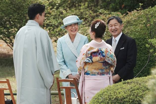 Japan imperial couple hosts spring garden party TOKYO, JAPAN - APRIL 17: (----EDITORIAL USE ONLY MANDATORY CREDIT - KAZUHIRO NOGI POOL AFP - NO MARKETING NO ADVERTISING CAMPAIGNS - DISTRIBUTED AS A SERVICE TO CLIENTS----) Japan s Emperor Naruhito (R) and Empress Masako (3rd R) chat with guests, Japanese Olympic figure skating pairs champions Riku Miura (2nd R) and Ryuichi Kihara (L), during the spring garden party at the Akasaka Palace imperial garden in Tokyo, capital of Japan, on April 17, 2026. Kazuhiro Nogi Pool Afp Anadolu Tokyo Japan. Editorial use only. Please get in touch for any other usage.  Copyright: x2026xAnadoluxKazuhiroxNogix xPoolx xAfpx