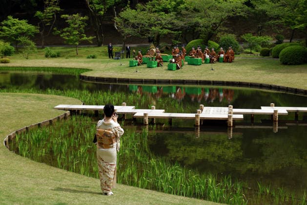 Japan imperial couple hosts spring garden party TOKYO, JAPAN - APRIL 17: (----EDITORIAL USE ONLY MANDATORY CREDIT - FRANCK ROBICHON POOL EPA - NO MARKETING NO ADVERTISING CAMPAIGNS - DISTRIBUTED AS A SERVICE TO CLIENTS----) A guest takes pictures of musicians playing Gagaku, ancient Japanese court music, during the Spring Imperial Garden Party at the Akasaka Imperial Gardens in Tokyo, Japan, 17 April 2026. Japan’s Emperor Naruhito and Empress Masako host the annual Spring Imperial Garden Party at the Akasaka Imperial Gardens inviting around 1,700 guests. Franck Robichon Pool EPA Anadolu Tokyo Japan. Editorial use only. Please get in touch for any other usage.  Copyright: x2026xAnadoluxFranckxRobichonx xPoolx xEPAx