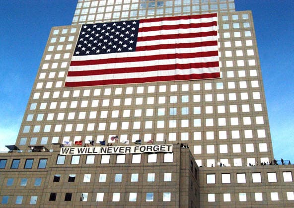 9 11 Anniversary at World Trade Center Sep 11, 2004; New York, NY, USA; The September 11th Commemoration Ceremony on the third anniversary of the attacks at the World Trade Center, Ground Zero Site. PICTURED: We Will Never Forget sign and flag.. Copyright: xBrookexIsmach-KPAx