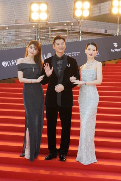HONG KONG, CHINA - APRIL 19: Actor Carlos Chan Ka-lok (L2), his wife actress Shiga Lin Sze-nga (L1), actress Fish Liew Chi Yu arrive at the red carpet for the 44th Hong Kong Film Awards on April 19, 2026 in Hong Kong, China.  Copyright: xVCGx 111635861890