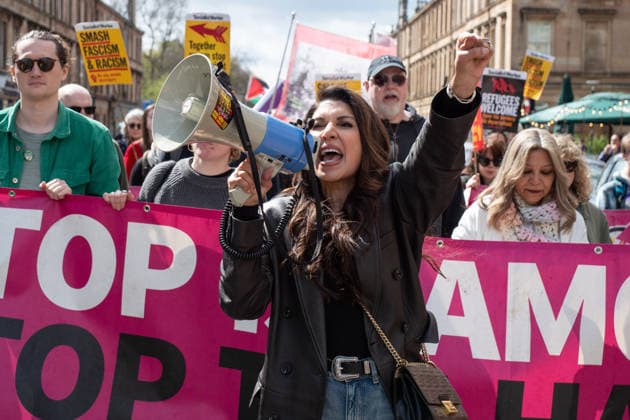 April 19, 2026, Glasgow, Scotland, UK: Hundreds of activists aligned with Stand Up To Racism held a demonstration to show solidarity with migrants and minority groups and to counter rising anti-immigration sentiment. The march was part of a wider series of unity marches held across Scotland aimed at opposing racism, the far right and Islamophobia. Glasgow UK  - ZUMAs357 20260419_zip_s357_017 Copyright: xCameronxScottx