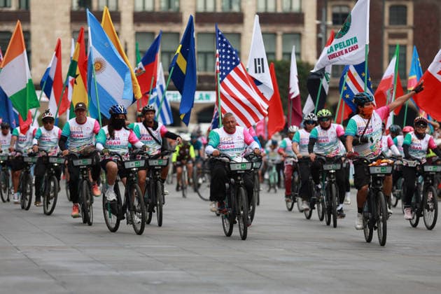 Thousands of cyclists celebrate new bike lane infrastructure in Mexico City MEXICO CITY, MEXICO - APRIL 19: Cyclists carrying flags ride during the inauguration of the Gran Tenochtitlan bike lane, at Zocalo square, in Mexico City, Mexico on April 19, 2026. The Mexico City government called on thousands of cyclists to form a large-scale bicycle shape to mark the inauguration of a bike lane of more than 30 km, which will connect the city center with southern Mexico City. Daniel Cardenas Anadolu Mexico City Mexico. Editorial use only. Please get in touch for any other usage.  Copyright: x2026xAnadoluxDanielxCardenasx