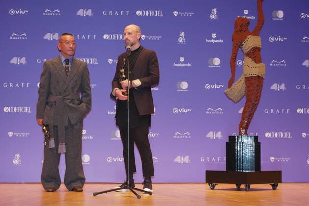 HONG KONG, CHINA - APRIL 19: Japanese musician and composer Ryuichi Sakamoto, UK based musician, film-composer Nate Connelly pose with trophies at backstage during the 44th Hong Kong Film Awards on April 19, 2026 in Hong Kong, China.  Copyright: xVCGx 111635891447