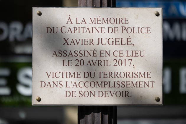 Ceremony in tribute to Xavier Jugele - Paris Commemorative plaque during a ceremony to pay tribute to late police officer Xavier Jugele on the Champs-Elysees avenue in Paris on April 20, 2026. On April 20, 2017, Karim Cheurfi killed police officer Xavier Jugele and wounded two of his colleagues on the Champs-Elysees in a terrorist attack, before being shot dead by return fire. Photo by Raphael Lafargue ABACAPRESS.COM Paris France  Copyright: xLafarguexRaphael ABACAx