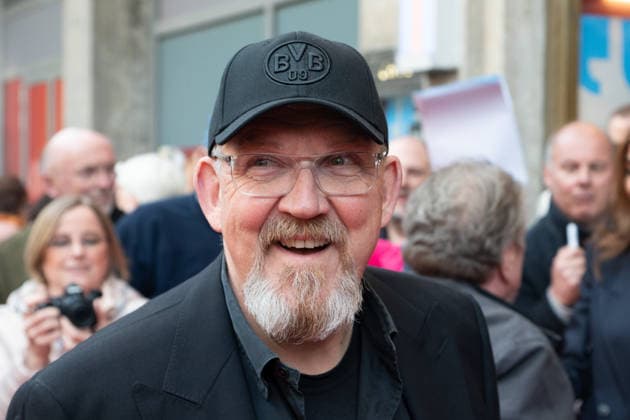 Actor Dietmar BAER, bear, portrait, portrait, single image, cropped single motif, red carpet, red carpet show, arrival, arrival, film premiere Vier von hier, 21 04 2026, in the Lichtburg in Essen,