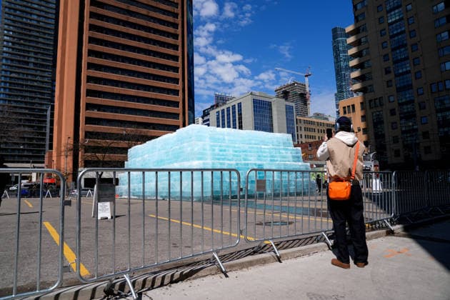 Ice Sculpture Draws Crowd for Drake’s New Album in Toronto TORONTO, CANADA - APRIL 21 : People gather around an ice sculpture, installed in a parking lot as part of a promotional campaign for Canadian rapper Drake’s new album ICEMAN in Toronto, Ontario, Canada on April 21, 2026. Mert Alper Dervis Anadolu Ontario Canada. Editorial use only. Please get in touch for any other usage.  Copyright: x2026xAnadoluxMertxAlperxDervisx
