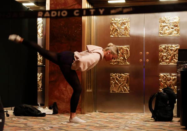 Dancers warm up in the Grand Foyer at Radio City Music Hall before auditioning at the Rockettes open call auditions at Radio City Music Hall in New York City on Wednesday, April 22, 2026. Dancers attending the audition will be considered for a spot on the Rockettes line in the 2026 Christmas Spectacular Starring the Radio City Rockettes and for an invitation to participate in the company s no-fee dancer development.programming this summer which serves as the Rockettes main talent pipeline.  NYP20260422108 JohnxAngelillo