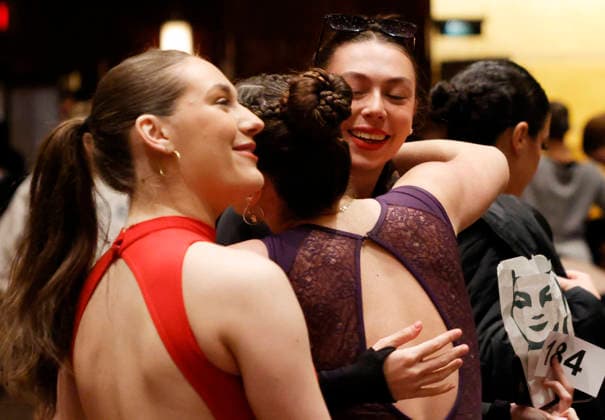 Dancers greet each other when they warm up in the Grand Foyer at Radio City Music Hall before auditioning at the Rockettes open call auditions at Radio City Music Hall in New York City on Wednesday, April 22, 2026. Dancers attending the audition will be considered for a spot on the Rockettes line in the 2026 Christmas Spectacular Starring the Radio City Rockettes and for an invitation to participate in the company s no-fee dancer development.programming this summer which serves as the Rockettes main talent pipeline.  NYP20260422133 JohnxAngelillo