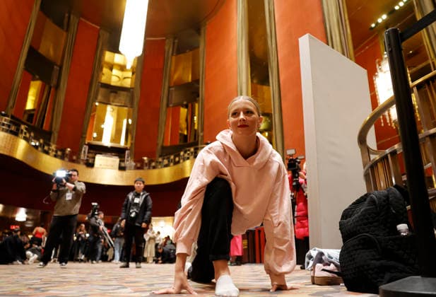 Dancers warm up in the Grand Foyer at Radio City Music Hall before auditioning at the Rockettes open call auditions at Radio City Music Hall in New York City on Wednesday, April 22, 2026. Dancers attending the audition will be considered for a spot on the Rockettes line in the 2026 Christmas Spectacular Starring the Radio City Rockettes and for an invitation to participate in the company s no-fee dancer development.programming this summer which serves as the Rockettes main talent pipeline.  NYP20260422103 JohnxAngelillo