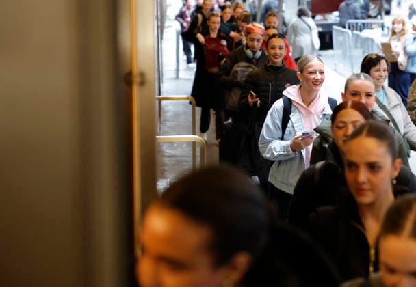 Dancers wait outside to enter the Grand Foyer at Radio City Music Hall before auditioning at the Rockettes open call auditions at Radio City Music Hall in New York City on Wednesday, April 22, 2026. Dancers attending the audition will be considered for a spot on the Rockettes line in the 2026 Christmas Spectacular Starring the Radio City Rockettes and for an invitation to participate in the company s no-fee dancer development.programming this summer which serves as the Rockettes main talent pipeline.  NYP20260422104 JohnxAngelillo