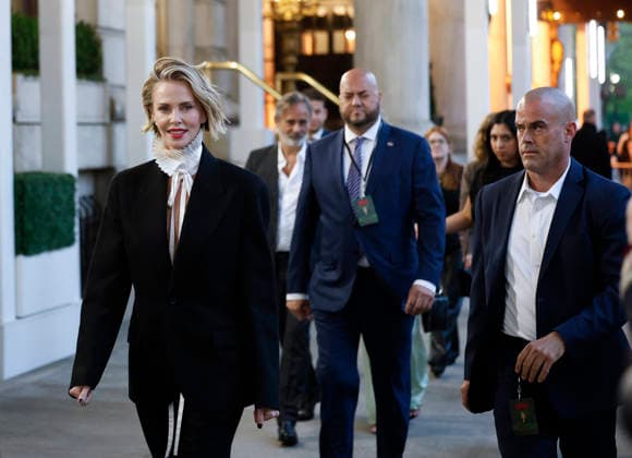 Charlize Theron and Baltasar Kormákur walk to The Paris Theater after the red carpet at Netflix s APEX New York Premiere on Wednesday, April 22, 2026 in New York City.  NYP20260422202 JohnxAngelillo