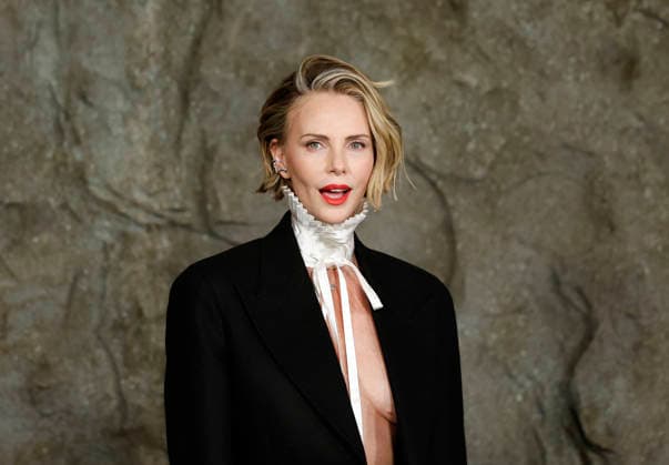 Charlize Theron arrives on the red carpet at Netflix s APEX New York Premiere at The Paris Theater on Wednesday, April 22, 2026 in New York City.  NYP20260422214 JohnxAngelillo