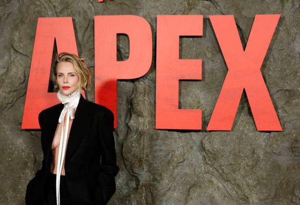 Charlize Theron arrives on the red carpet at Netflix s APEX New York Premiere at The Paris Theater on Wednesday, April 22, 2026 in New York City.  NYP20260422215 JohnxAngelillo