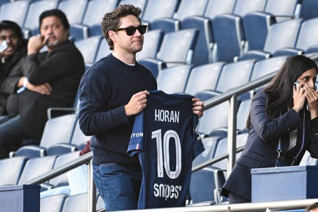 Niall Horen At Parc des Princes - Paris former member of the band One Direction Niall Horen and his girlfriend Amelia Woolley attending the soccer match between PSG and Nantes in Paris, France on April 22, 2026. Photo by Florian Poitout ABACAPRESS.COM Paris France  Copyright: xPoitoutxFlorian ABACAx