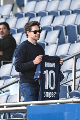 Niall Horen At Parc des Princes - Paris former member of the band One Direction Niall Horen and his girlfriend Amelia Woolley attending the soccer match between PSG and Nantes in Paris, France on April 22, 2026. Photo by Florian Poitout ABACAPRESS.COM Paris France  Copyright: xPoitoutxFlorian ABACAx
