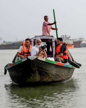 PM Modi visits Kolkata s Hooghly River Kolkata West Bengal , Apr 24 (ANI): Prime Minister Narendra Modi holds a camera in a boat as he visits the Hooghly River, in Kolkata on Friday. (@narendramodi ANI Photo) kolkata West Bengal India Copyright: xANIx ANI_20260424032