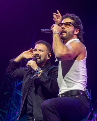 April 24, 2026, Indio, California, U.S: SHAY MOONEY and DAN SMYERS of Dan + Shay during Stagecoach Music Festival at Empire Polo Club in Indio, California Indio U.S  - ZUMAs135 20260424_zap_s135_112 Copyright: xDanielxDeSloverx