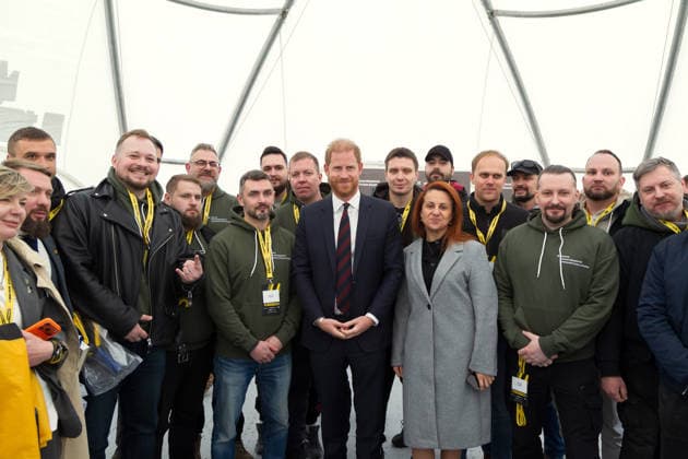 Prince Harry (C), The Duke of Sussex, and Ukraine’s Minister for Veterans Affairs Nataliia Kalmykova pose with the team of the Center for Scaling Technology Solutions at their booth in the mobile town during the Invictus Games Ukraine Forum, dedicated to the 10th anniversary of the Invictus Games movement in Ukraine, at the National Museum of the History of Ukraine in WWII Memorial Complex, Kyiv, Ukraine, April 24, 2026. Ukraine has participated in the Invictus Games since 2017, showing strong results and steady team growth. The Ukrainian team competes in athletics, archery, rowing, and swimming, earning numerous medals and prize placements. (Photo by Danylo Antoniuk Ukrinform) Invictus Games Ukraine Forum in Kyiv Copyright: xKirillxChubotinx
