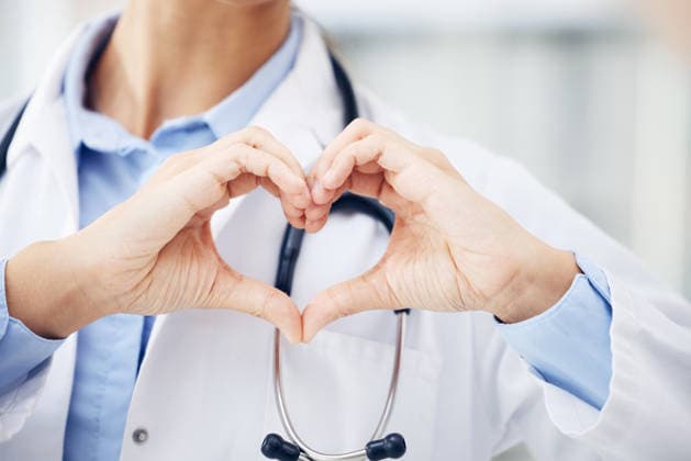 Let me help you take care. Closeup shot of an unrecognisable doctor making a heart shape with her hands in a hospital (License=RF) ,model released, Symbolfoto  Copyright: xZoonar.com KasperxRavlox 19227154 ,model released, Symbolfoto ,property released