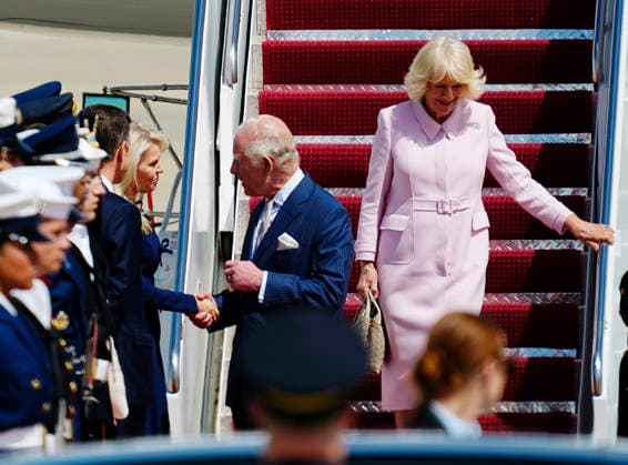 Britain s King Charles III shakes hands with U.S. Chief of Protocol Monica Crowley as he and Queen Camilla walk off their plane during a flight line arrival ceremony at Joint Base Andrews in Suitland, Maryland on Monday, April 27, 2026. The king is on a four-day state visit to the U.S. and will stop in New York and Washington, where he will meet with President Trump and deliver an address to Congress.  WAP20260427813 BONNIExCASH