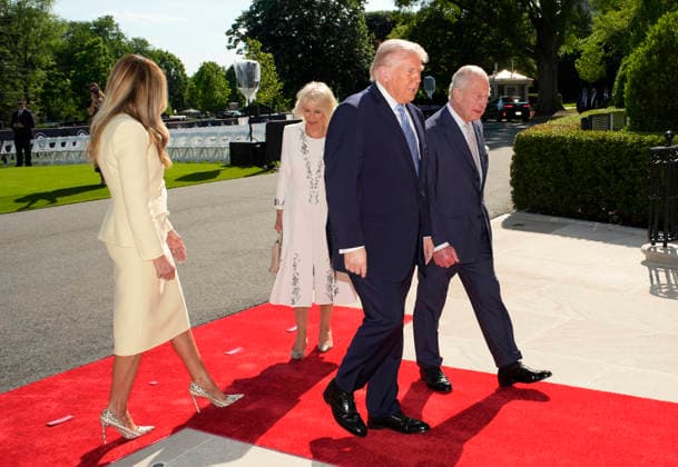 Britain s King Charles III and Queen Camilla are greeted by President Donald Trump and First Lady Melania Trump as they arrive at the White House in Washington DC on Monday, April 27, 2026. The king is on a four-day state visit to the U.S. and will stop in New York and Washington, where he will meet with U.S. officials and deliver an address to Congress.  WAX20260427802 YurixGripas