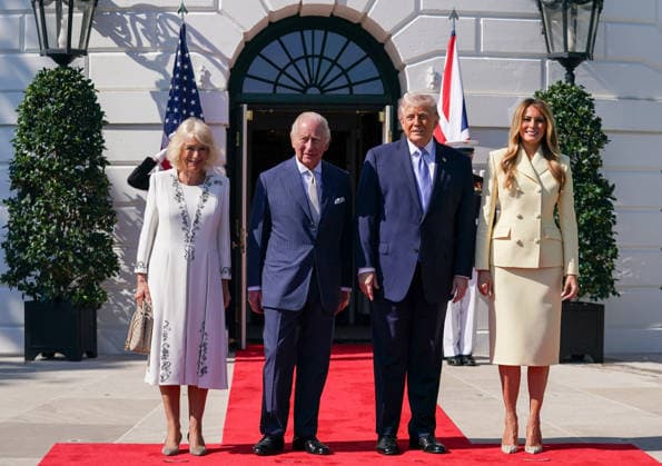 Britain s King Charles III (2nd L) and Queen Camilla (L) are greeted by President Donald Trump (2nd R) and First Lady Melania Trump as they arrive at the White House in Washington DC on Monday, April 27, 2026. The king is on a four-day state visit to the U.S. and will stop in New York and Washington, where he will meet with U.S. officials and deliver an address to Congress.  WAX20260427805 AllisonxRobbert