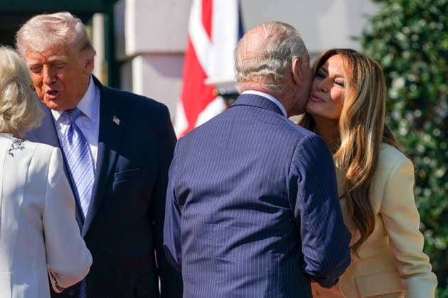 Britain s King Charles III and Queen Camilla are greeted by President Donald Trump and First Lady Melania Trump as they arrive at the White House in Washington DC on Monday, April 27, 2026. The king is on a four-day state visit to the U.S. and will stop in New York and Washington, where he will meet with U.S. officials and deliver an address to Congress.  WAX20260427806 AllisonxRobbert