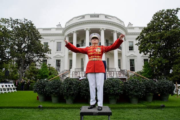 The United States Marine Band, known as The President s Own, performs before the arrival of Britain s King Charles III and Queen Camilla at the White House in Washington DC on Tuesday, April 28, 2026. The king is on a four-day state visit to the U.S. and will stop in New York and Washington, where he will meet with U.S. officials and deliver an address to Congress.  WAX20260428802 YURIxGRIPAS
