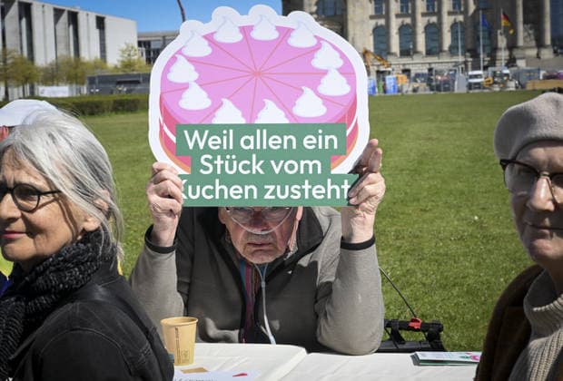 Retirees gather at Bundestag to highlight old-age poverty in Germany BERLIN, GERMANY - APRIL 28: Demonstrators gather in front of the Federal Parliament building (Bundestag) to demand a monthly unconditional basic income of at least 1,200 euros for retirees in Berlin, Germany, on April 28, 2026. Organized under the theme Germany s largest coffee meeting, the protest aimed to draw attention to poverty in old age and called for guaranteed financial security for all pensioners. Halil Sagirkaya Anadolu Berlin Germany. Editorial use only. Please get in touch for any other usage.  Copyright: x2026xAnadoluxHalilxSagirkayax