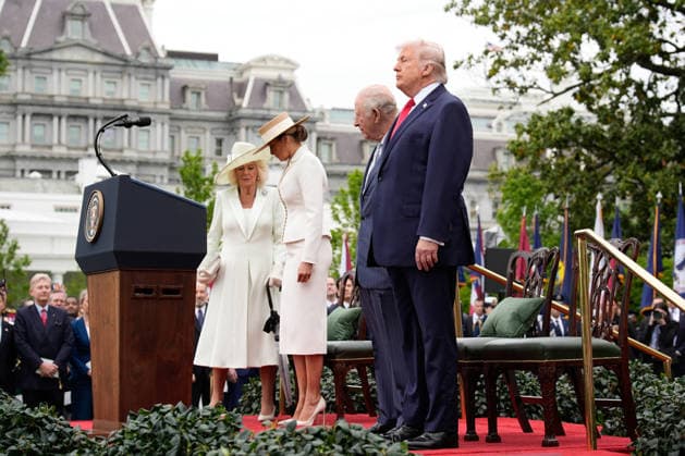 Britain s King Charles III and Queen Camilla are greeted by President Donald Trump and First Lady Melania Trump at an official welcoming ceremony at the White House in Washington DC on Tuesday, April 28, 2026. The king is on a four-day state visit to the U.S. and will stop in New York and Washington, where he will meet with U.S. officials and deliver an address to Congress.  WAX20260428812 YURIxGRIPAS