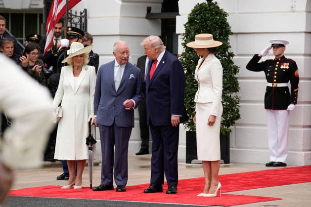 Britain s King Charles III and Queen Camilla are greeted by President Donald Trump and First Lady Melania Trump at an official welcoming ceremony at the White House in Washington DC on Tuesday, April 28, 2026. The king is on a four-day state visit to the U.S. and will stop in New York and Washington, where he will meet with U.S. officials and deliver an address to Congress.  WAX20260428813 YURIxGRIPAS