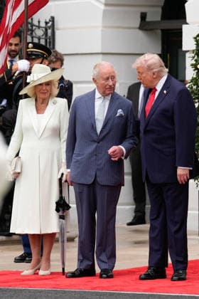 Britain s King Charles III and Queen Camilla are greeted by President Donald Trump at an official welcoming ceremony at the White House in Washington DC on Tuesday, April 28, 2026. The king is on a four-day state visit to the U.S. and will stop in New York and Washington, where he will meet with U.S. officials and deliver an address to Congress.  WAX20260428814 YURIxGRIPAS