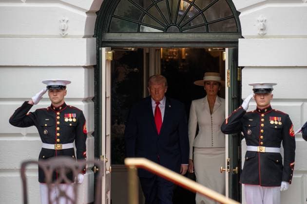 April 28, 2026, Washington, District Of Columbia, USA: President DONALD TRUMP and First Lady MELANIA TRUMP walk out of the White House to await the arrival of King Charles III and Queen Camilla. Washington USA  - ZUMAs365 20260428_znp_s365_009 Copyright: xJoeyxSussmanx
