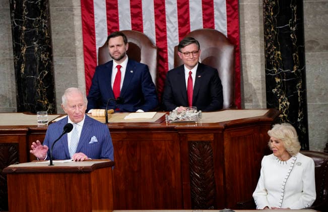 Britain s King Charles III delivers an address to a joint meeting of Congress as Queen Camilla (R), Speaker of the House Mike Johnson and Vice President JD Vance look on at the U.S. Capitol in Washington DC on Tuesday, April 28, 2026. The king and Queen Camilla are on a four-day state visit to the U.S. with stops in Washington and New York.  WAP20260428972 BONNIExCASH