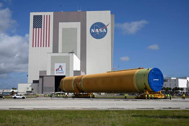 NASA s core stage of the Space Launch System rocket rolls to the Vehicle Assembly Building after arriving at the Kennedy Space Center, Florida on Tuesday April 28, 2026. This stage will be assembled at the facility and used to launch NASA s next mission Artemis III .  KSP20260428001 JOExMARINO