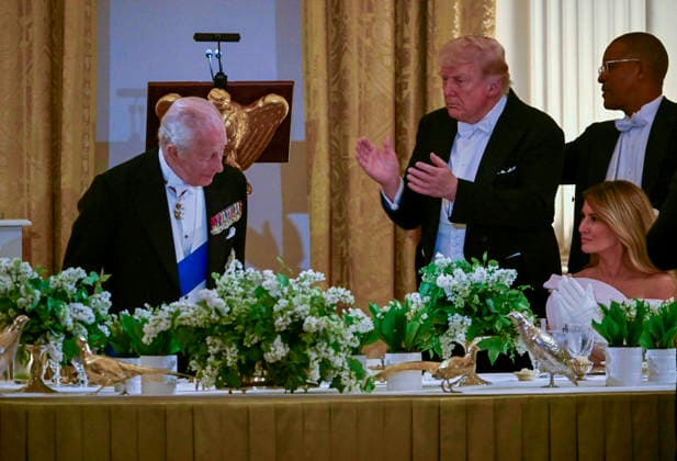 President Donald Trump applauds Great Britain s King Charles during a state dinner at the White House on Tuesday, April 28, 2026 in Washington, DC. Charles spoke to a joint session of Congress earlier in the day, and attended several events with U.S. President Donald Trump.  WAX20260428216 CraigxHudson