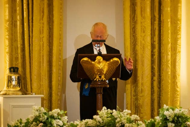 Great Britain s King Charles III presents the original bell from the H.M.S. Trump, a World War II-era submarine and inscribed Trump 1944 , as a gift to President Donald Trump during a State Dinner in the East Room of the White House on Tuesday, April 28, 2026 in Washington, D.C. Charles spoke to a joint session of Congress earlier in the day, and attended several events with U.S. President Donald Trump.  WAX20260428230 CraigxHudson
