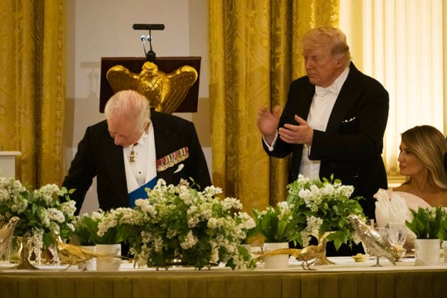 President Donald Trump claps after Great Britain s King Charles gives remarks during a state dinner with President Donald Trump and First Lady Melania Trump at the White House on Tuesday, April 28, 2026 in Washington, D.C. Charles spoke to a joint session of Congress earlier in the day, and attended several events with U.S. President Donald Trump.  WAX20260428225 CraigxHudson