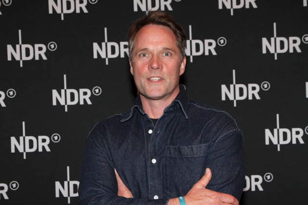 ABB LINDENBERG Matthias Schloo on the red carpet at the Kino Welt Premiere of ARD Dekou UDO Rebell Rockstar Icon at Astor Filmlounge in Hafencity on April 28, 2026 in Hamburg Hamburg Germany
