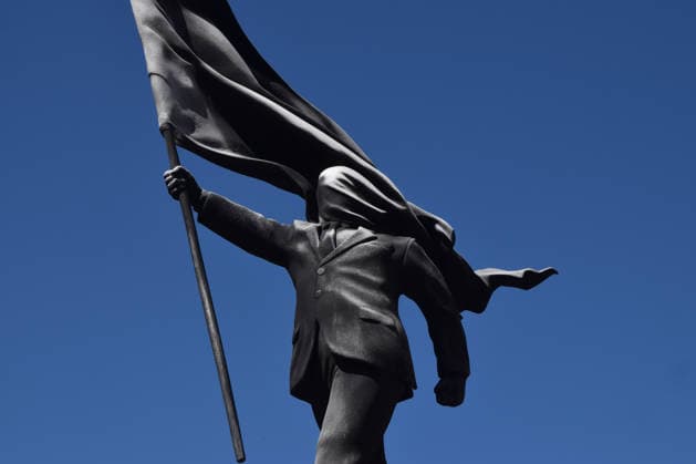 April 30, 2026, London, England, United Kingdom: A statue depicting a man holding a flag which covers his face, and signed Banksy at the base of the plinth, has appeared in Waterloo Place in Central London. The elusive street artist has now confirmed that the sculpture is his work. London United Kingdom - ZUMAv130 20260430_zip_v130_061 Copyright: xVukxValcicx