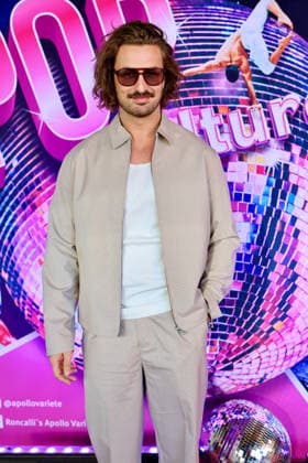 Premiere Roncalli s Apollo Variete POP Culture Nicolas Puschmann , TV Entertainer with the Apollo Disco Ball on the Red Carpet Düsseldorf Apollo Theater NRW Germany