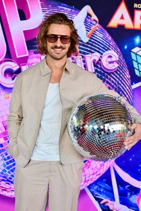 Premiere Roncalli s Apollo Variete POP Culture Nicolas Puschmann , TV Entertainer with the Apollo Disco Ball on the Red Carpet Düsseldorf Apollo Theater NRW Germany