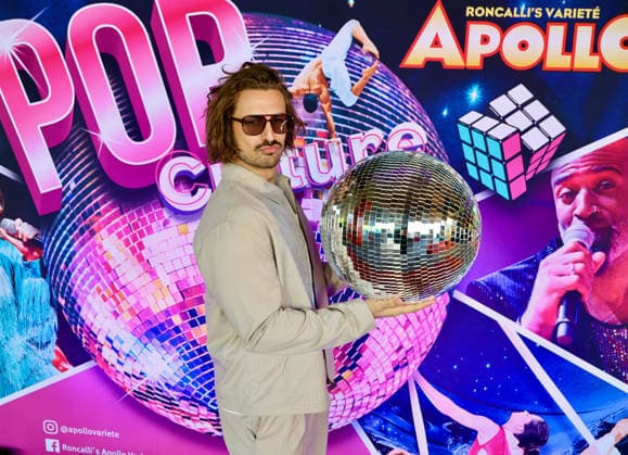 Premiere Roncalli s Apollo Variete POP Culture Nicolas Puschmann , TV Entertainer with the Apollo Disco Ball on the Red Carpet Düsseldorf Apollo Theater NRW Germany