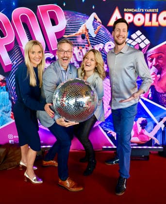 Premiere Roncalli s Apollo Variete POP Culture f l Tina Bockelmann with husband and actor Stefan Bockelmann, Lisa Feller and TV presenter Sven Kroll with the disco ball at the Red Carpet Düsseldorf Apollo Theater NRW Germany