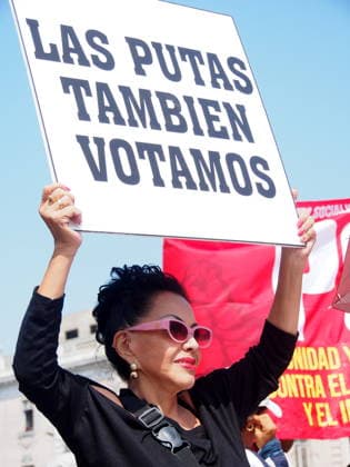 May 1, 2026, Lima, Peru: We Whores Vote Too, reads a sign held by ANGELA VILLON, politician, activist and former sex worker, when hundreds of unionists took Dos de Mayo square in Lima, in front of the headquarters of the General Central of Workers of Peru (CGTP), commemorating the International Workers Day held in the country. Lima Peru  - ZUMAg240 20260501_zip_g240_004 Copyright: xCarlosxGarciaxGranthonx