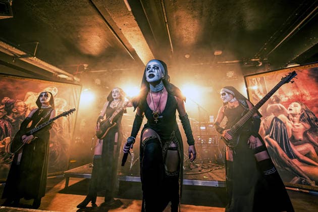 May 1, 2026, Manchester, United Kingdom: RUSALKA guitar, LAMIA Guitar, LILITH vocals and NIXE bass, of a female Rock band, Dogma, performing at Club Academy, Manchester UK Manchester United Kingdom  - ZUMAp211 20260501_aap_p211_016 Copyright: xAndyxVonxPipx
