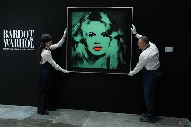May 1, 2026, Bronx, New York, USA: Auction assistants pose with Andy Warhol Brigitte Bardot during May Marquee Modern & Contemporary Auctions press preview at Sotheby s The Breuer in New York, NY on May 1, 2026. Bronx USA - ZUMAr339 20260501_znp_r339_020 Copyright: xLevxRadinx