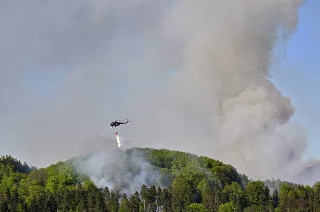 Firefighters are intervening this afternoon at a forest fire in Rynartice, part of the village of Jetrichovice in the Bohemian Switzerland National Park, Czech Republic, May 2, 2026. (CTKxPhoto OndrejxHajek) CTKPhotoP2026050204045  CTKPhotoP2026050204045