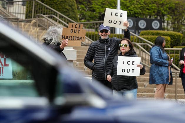 ICE Out Protest in Hazleton, US - 02 May 2026 Protester hold placards expressing their opinion during the demonstration. People gathered outside Hazleton City Hall for an ICE Out protest. Demonstrators opposed the city council s decision to join the Task Force 287(g) program, which allows local police to collaborate directly with U.S. Immigration and Customs Enforcement (ICE). Hazleton United States Copyright: xPaulxWeaverx xSOPAxImagesx PWeaver-ICEOut-260502-002